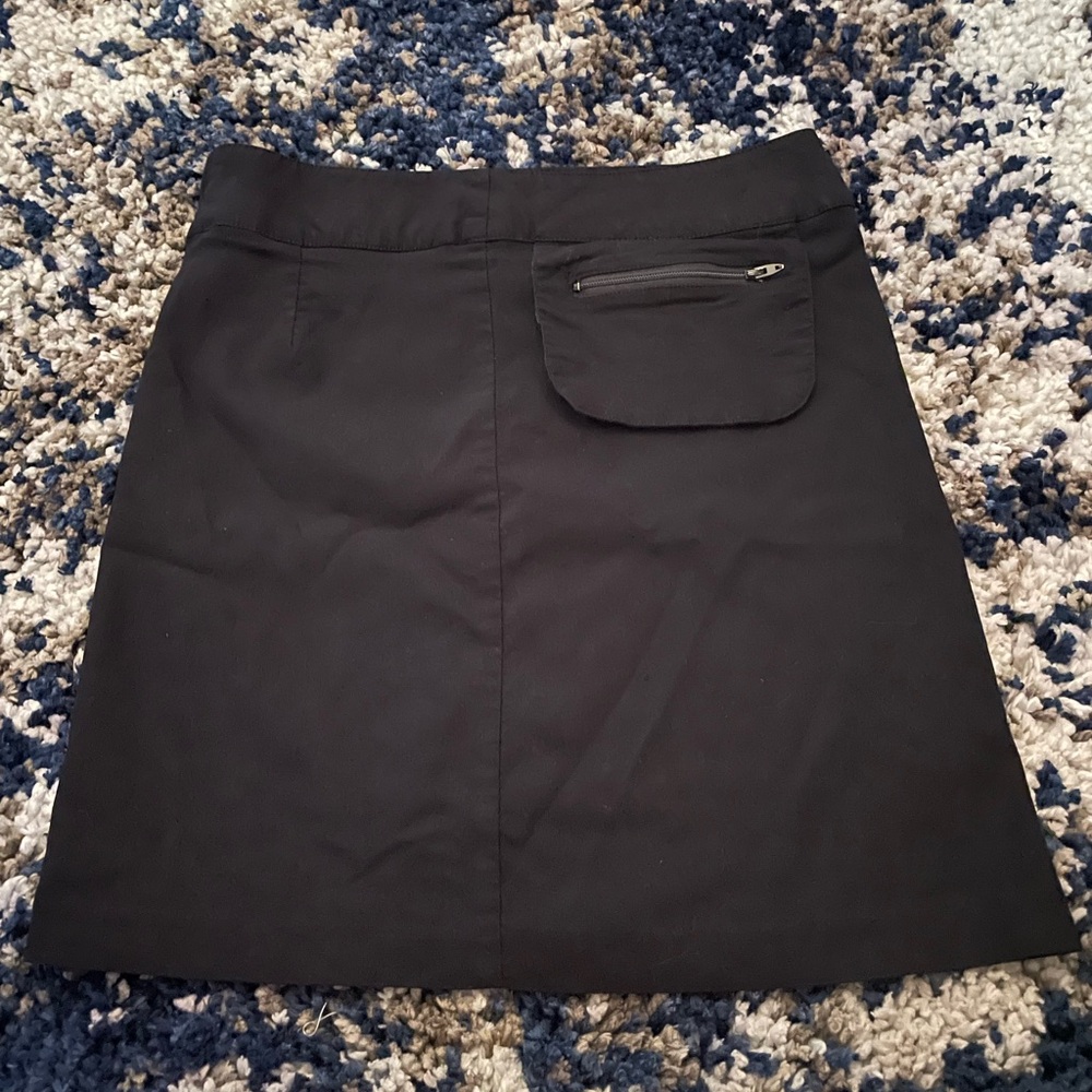 Tracy Evans Black Mini Skirt Sleek and Modern